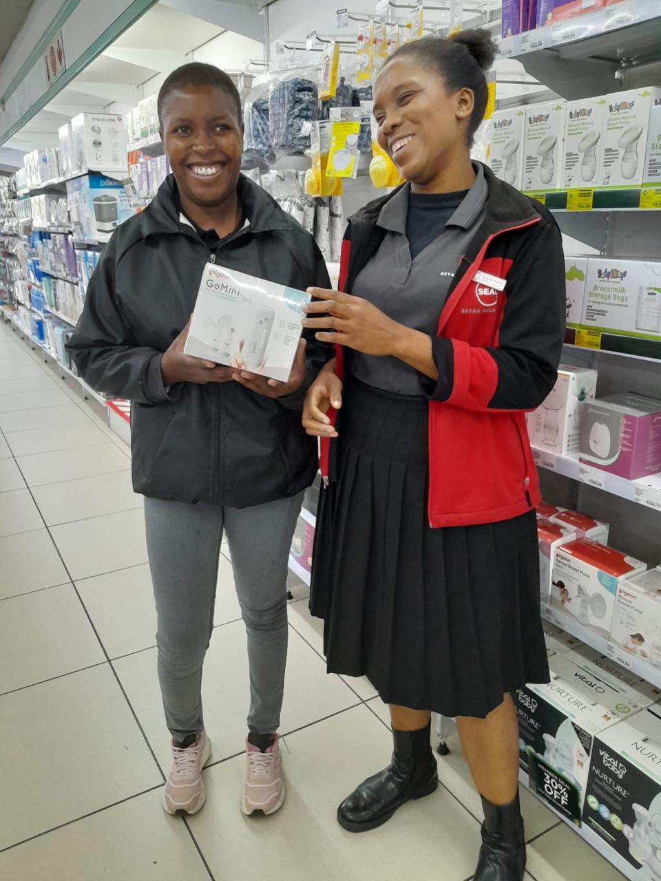SEAL representative laughing with a shopper